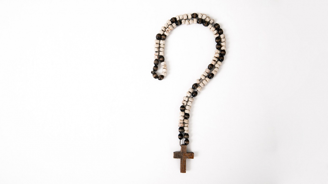 Gebetskette als Fragezeichen