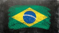 Was wird sich in Brasilien mit der WM ändern? Darüber sprechen brasilianische Sozialarbeiter mit Schülern in Berlin